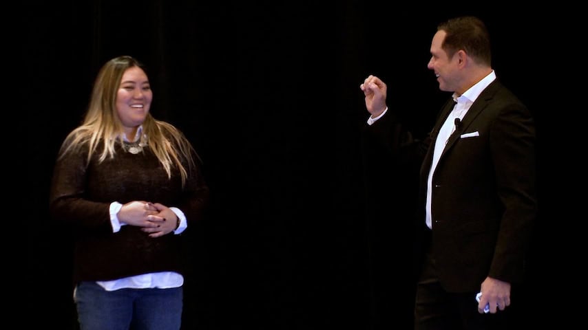 Randy Charach mentalist performing on stage.